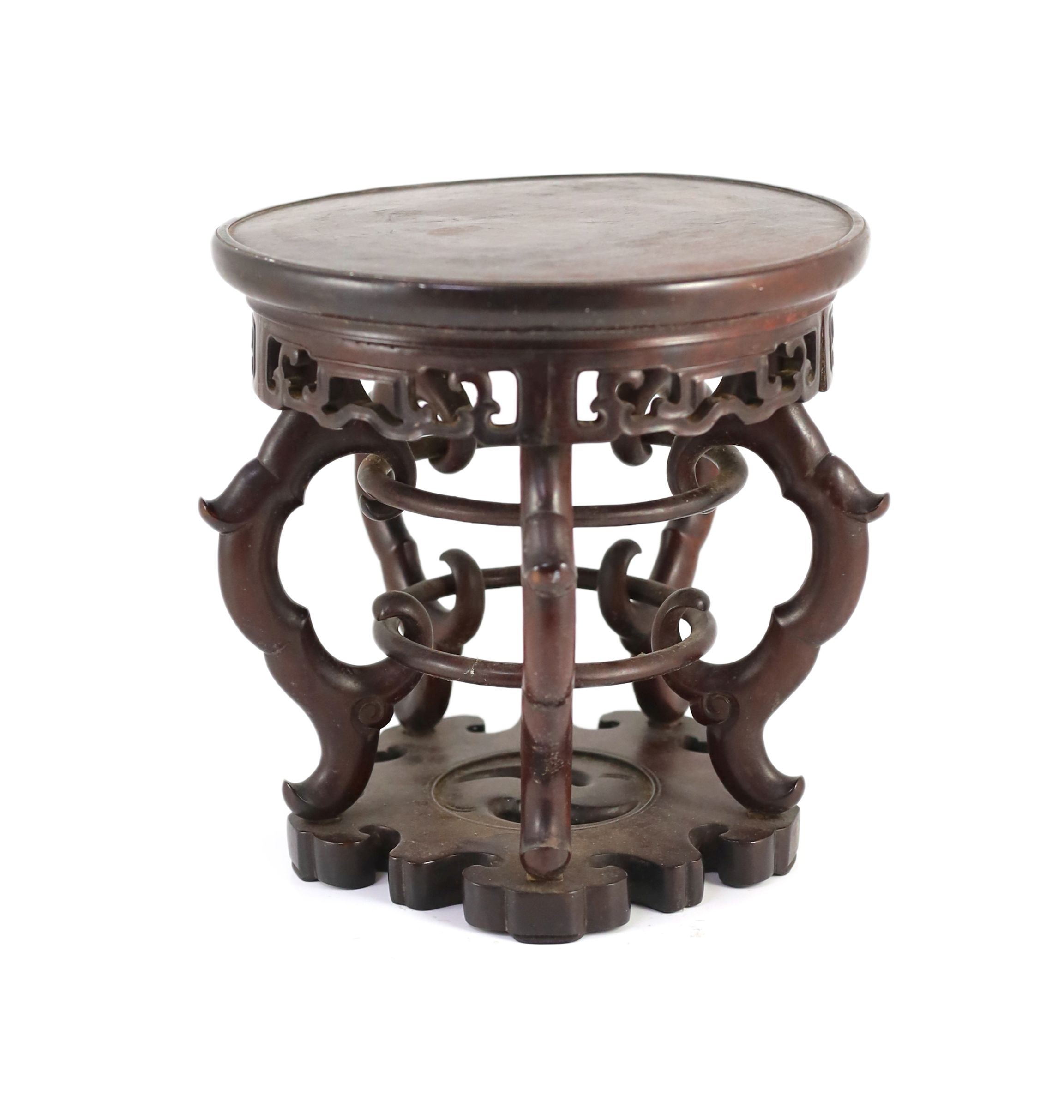 A Chinese hardwood stand, 19th century, 21.5cm high